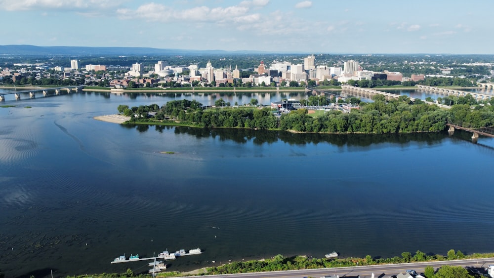 a body of water with a city in the background