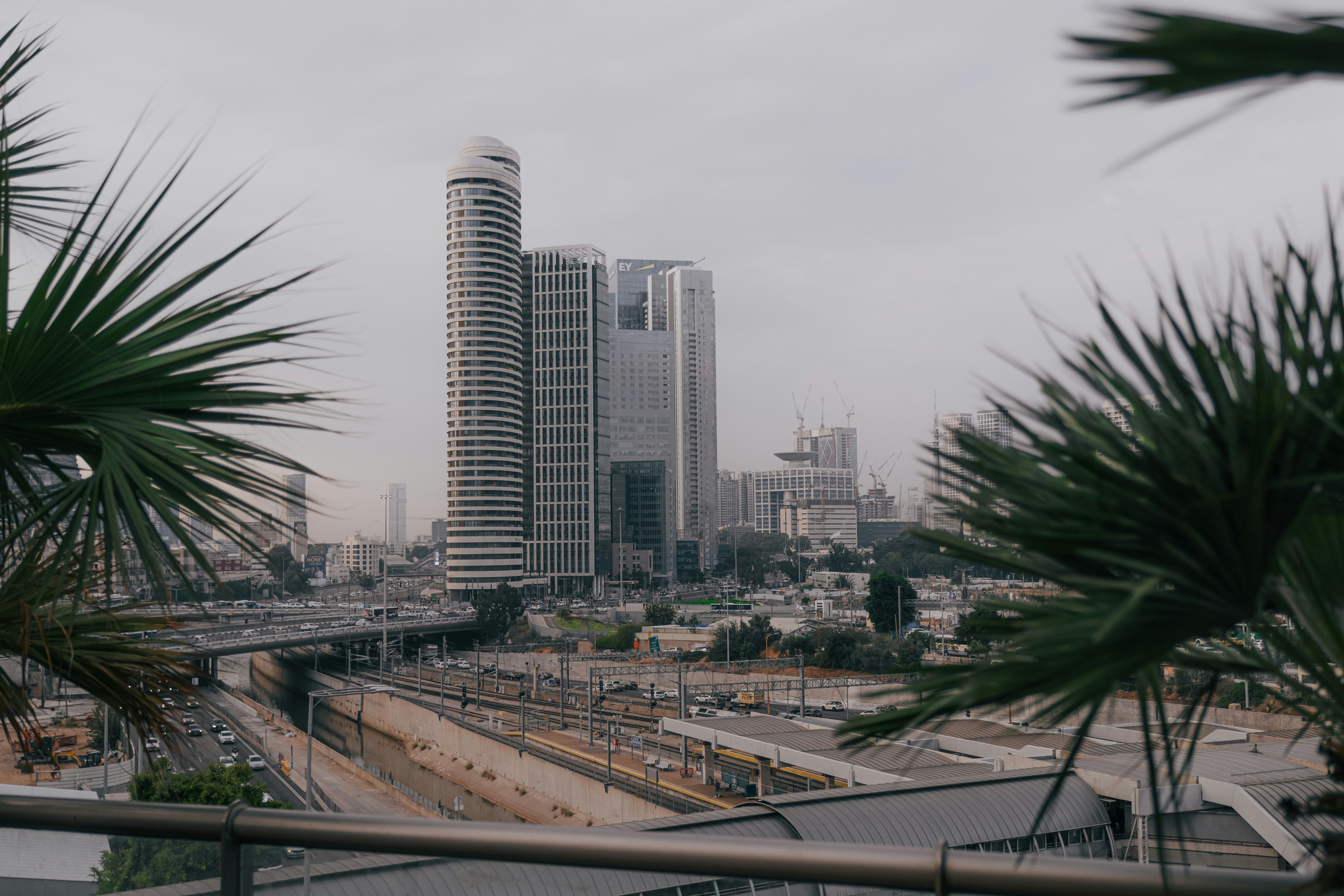 a city skyline with a bridge
