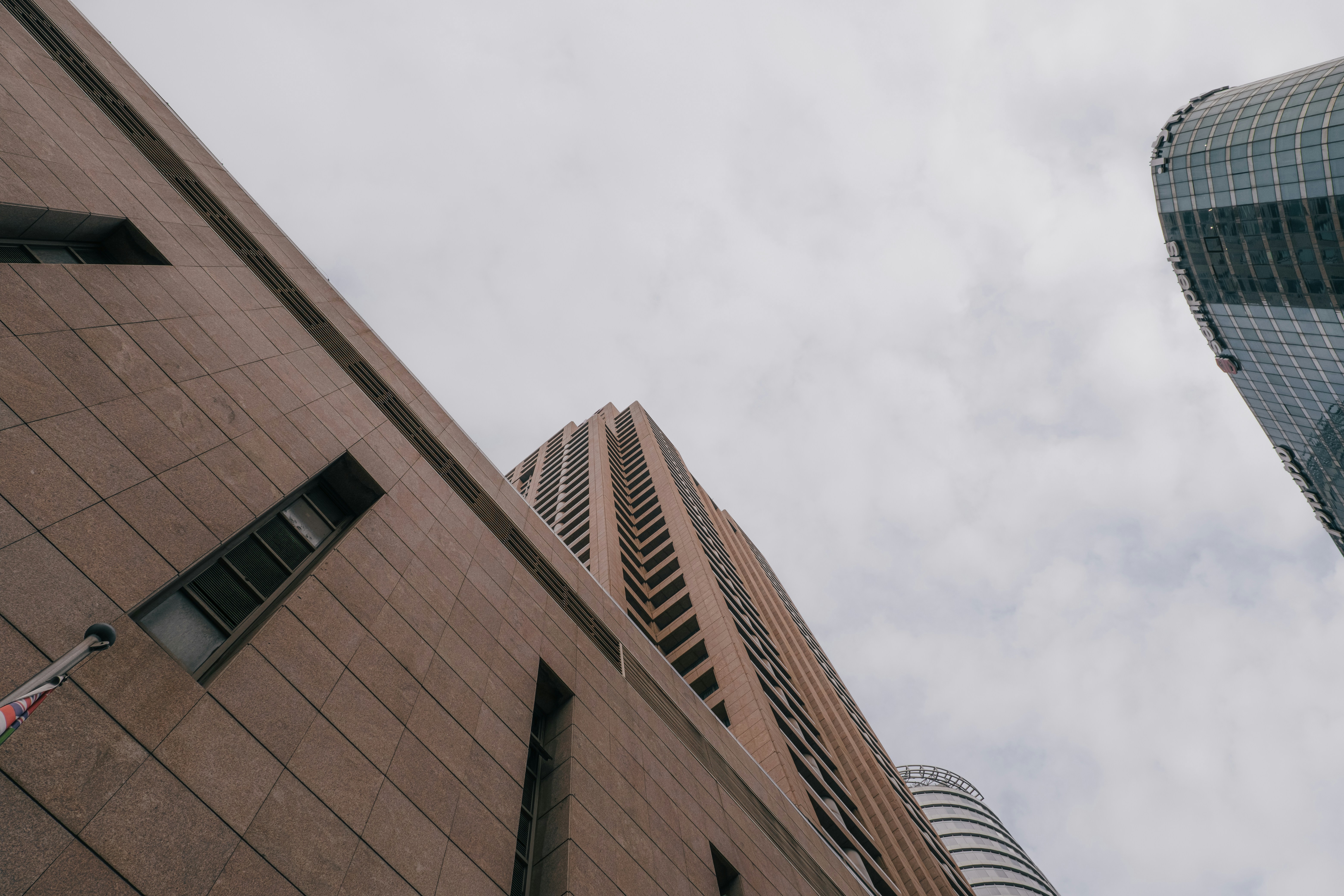 a building with a tall glass tower