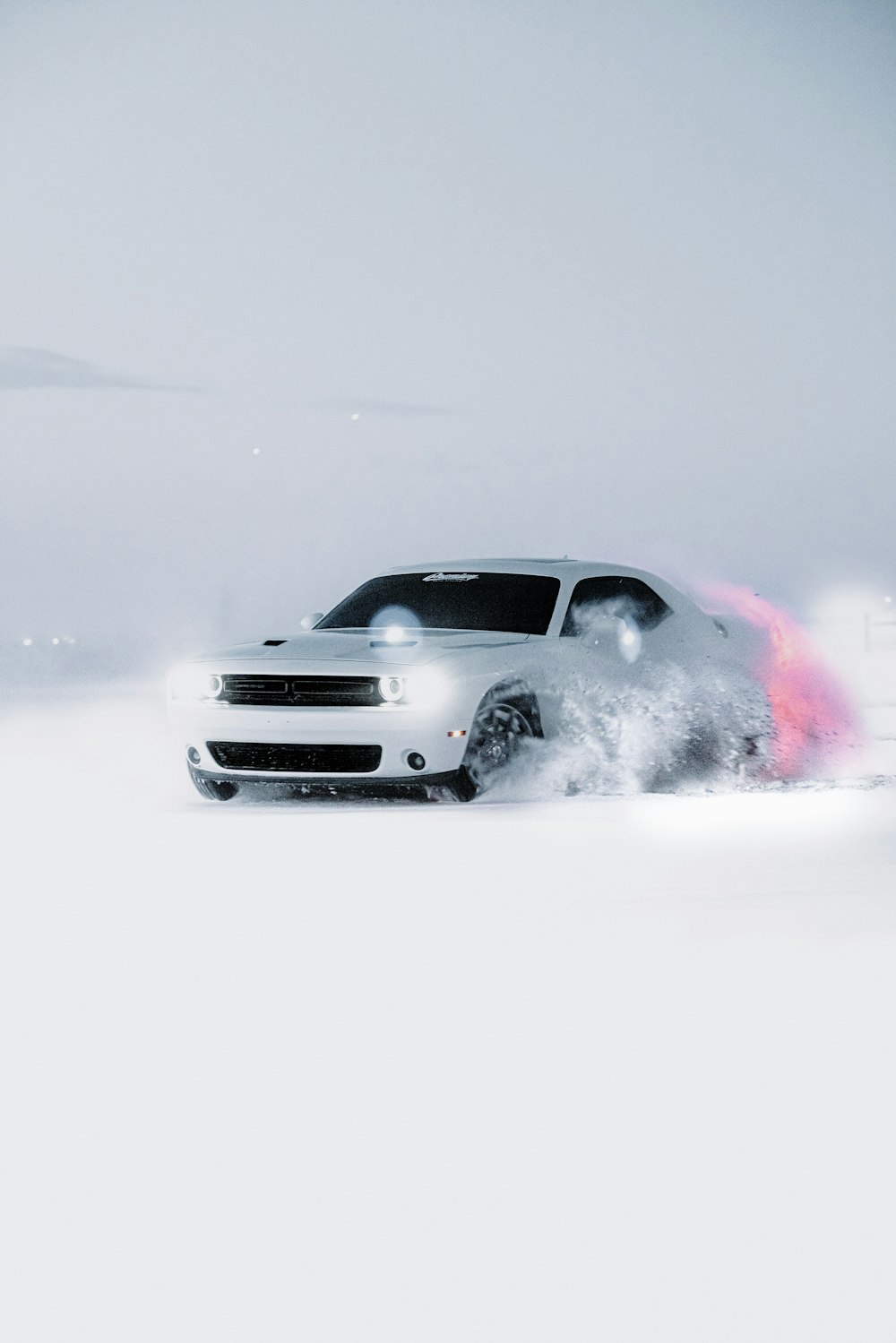 a car driving through a snowy area