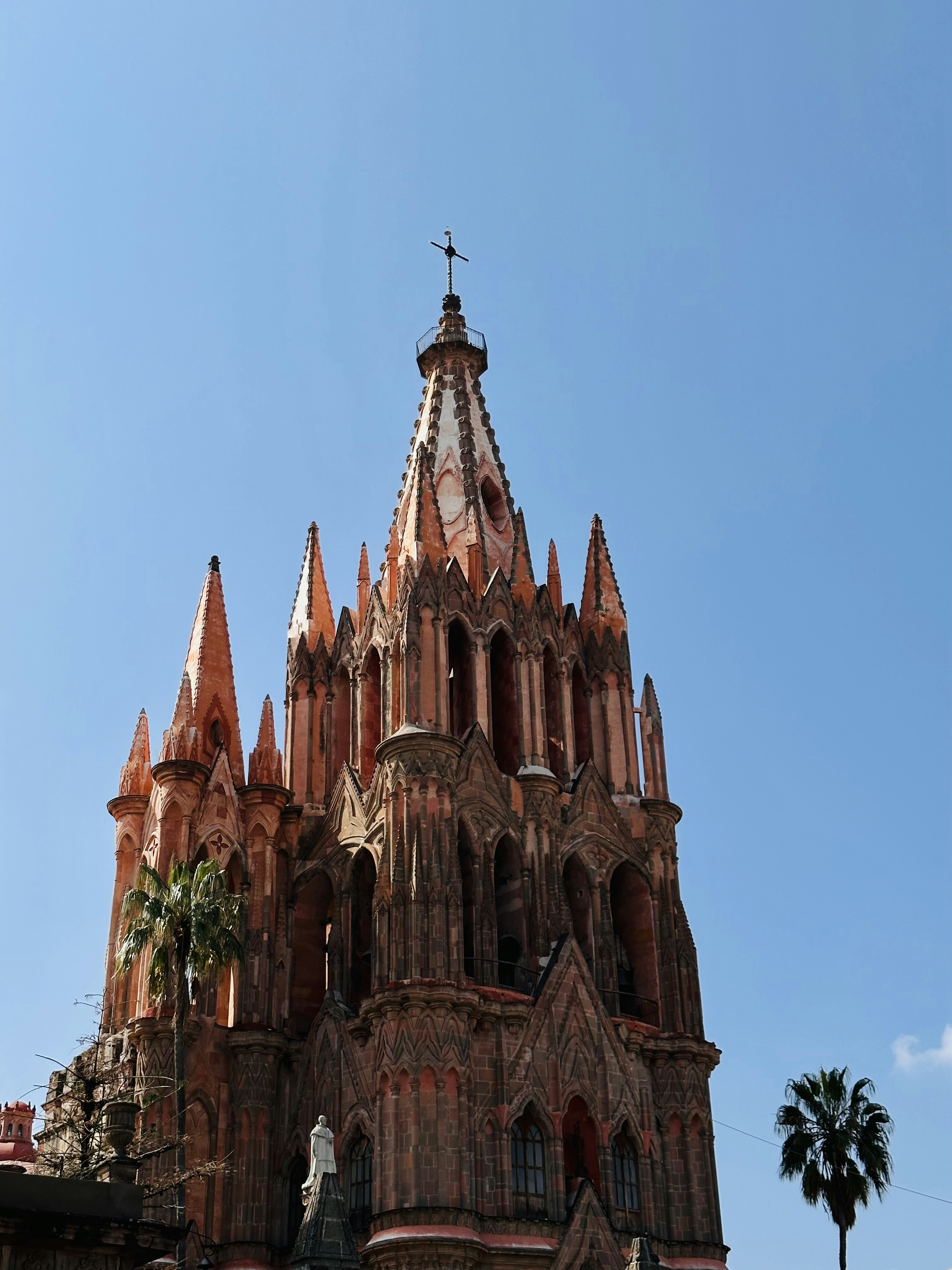 A large building with a cross on top photo – Free Arch Image on Unsplash