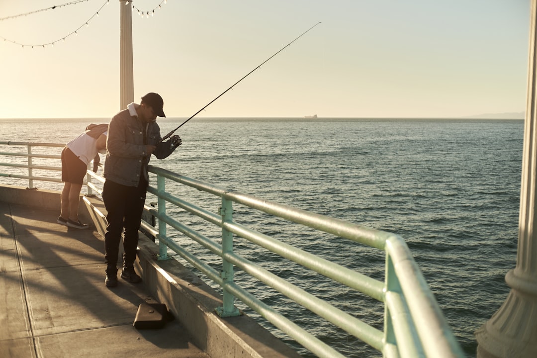 a person fishing on a boat,
