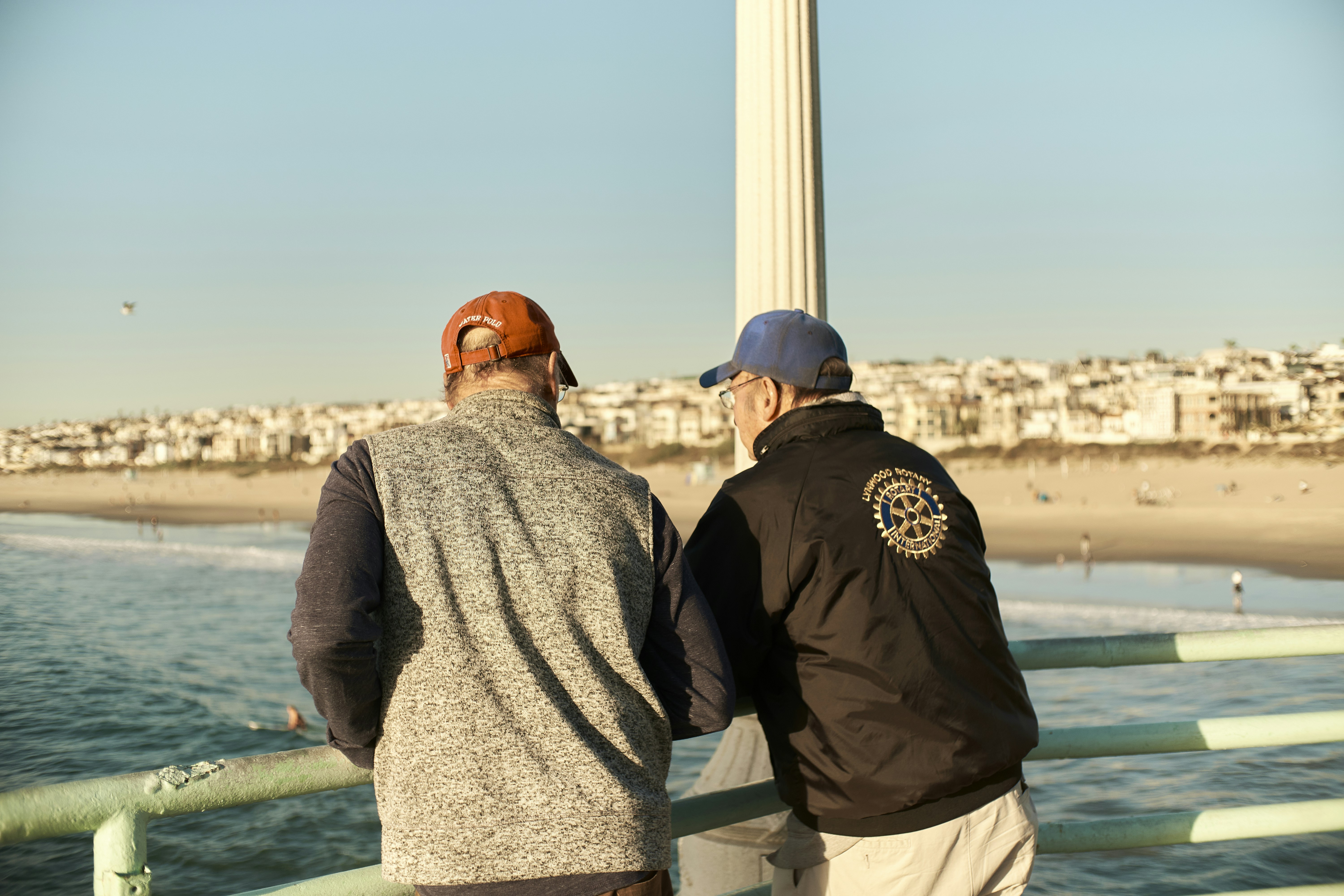 two people looking at a tall tower, 