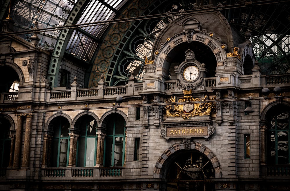 a large building with a clock on the front