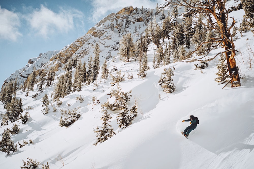 a person skiing down a mountain