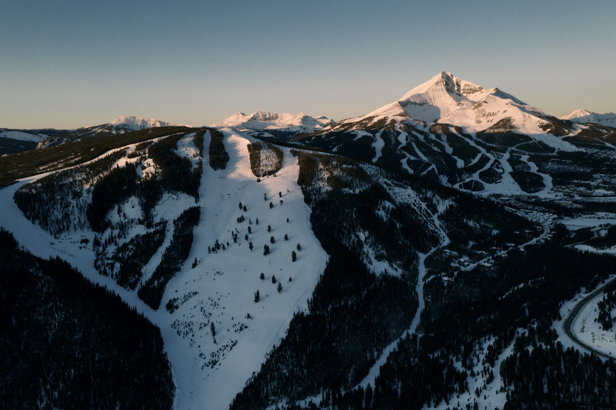 Snowy ski runs and Lone Peak at Big Sky Resort in Montana