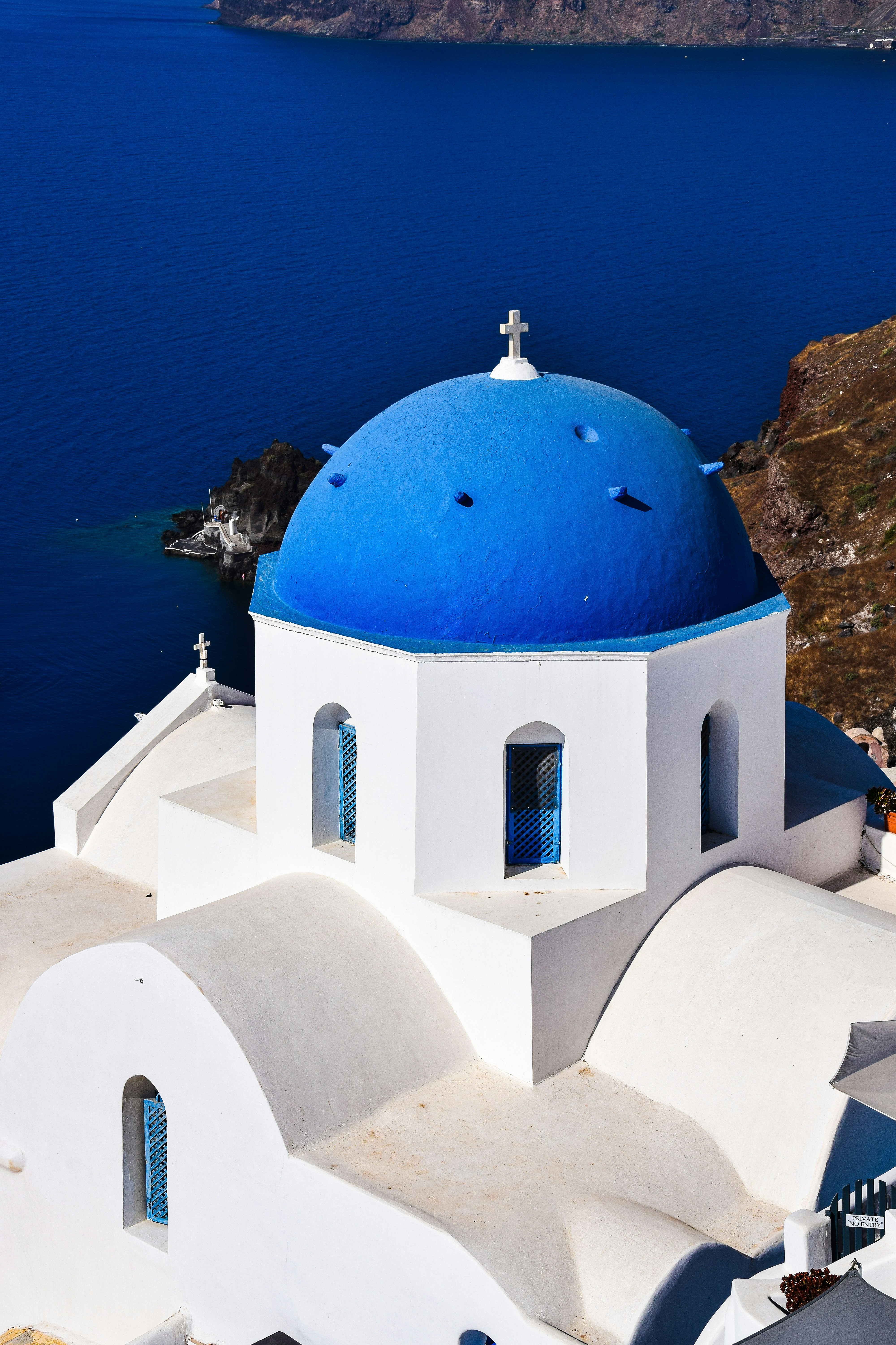 a white building with a blue dome