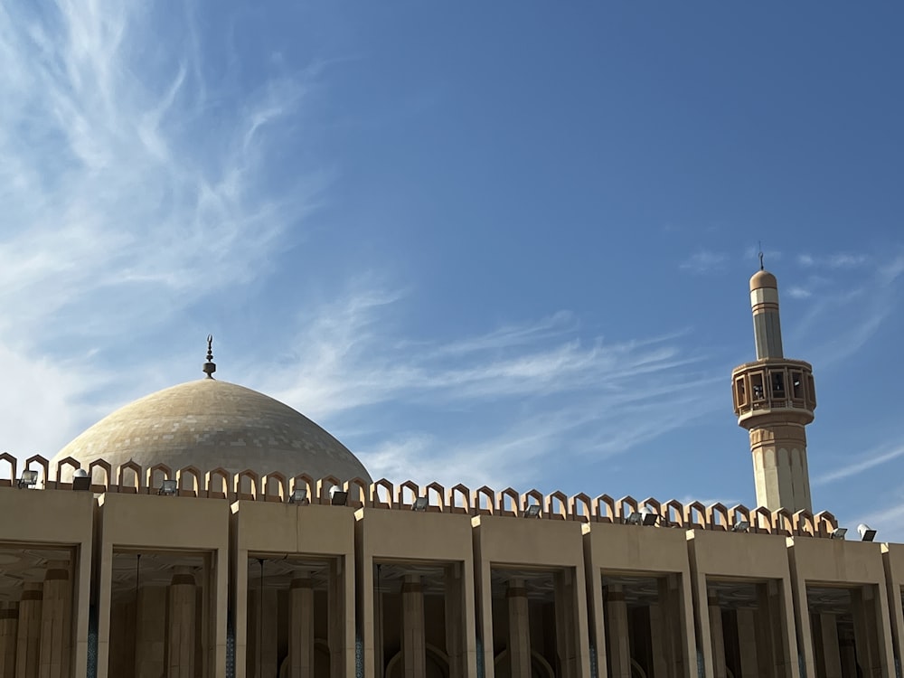 a domed building with a tower