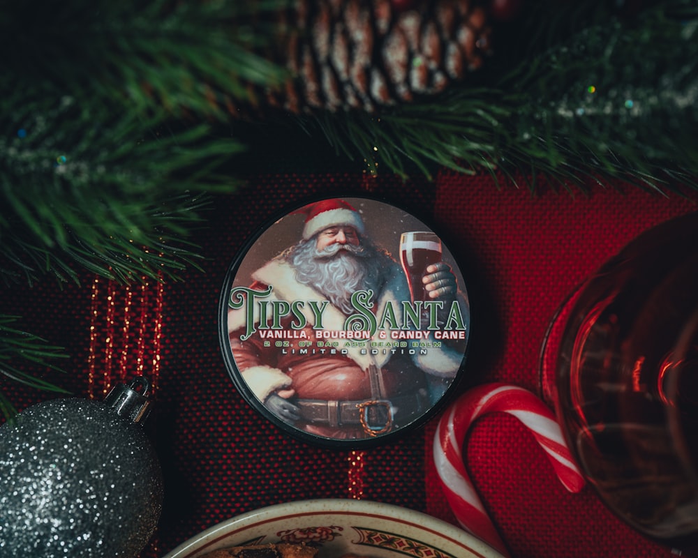 a christmas ornament sitting on top of a christmas tree