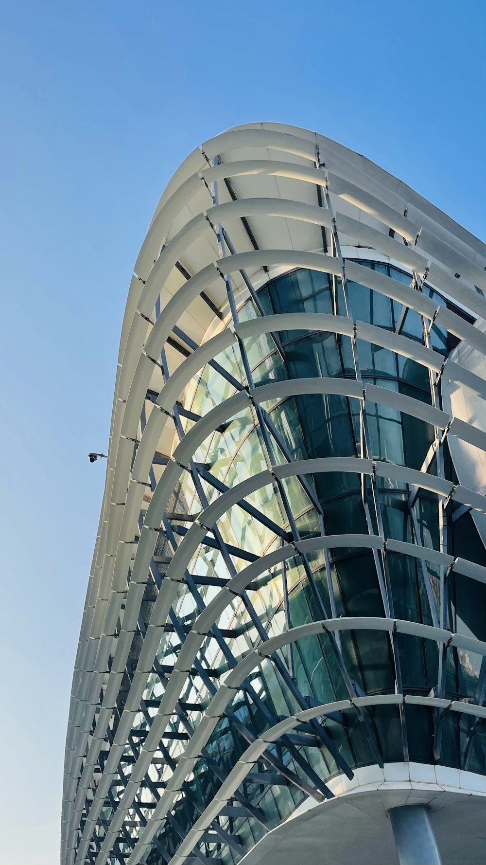 a very tall building with a sky background