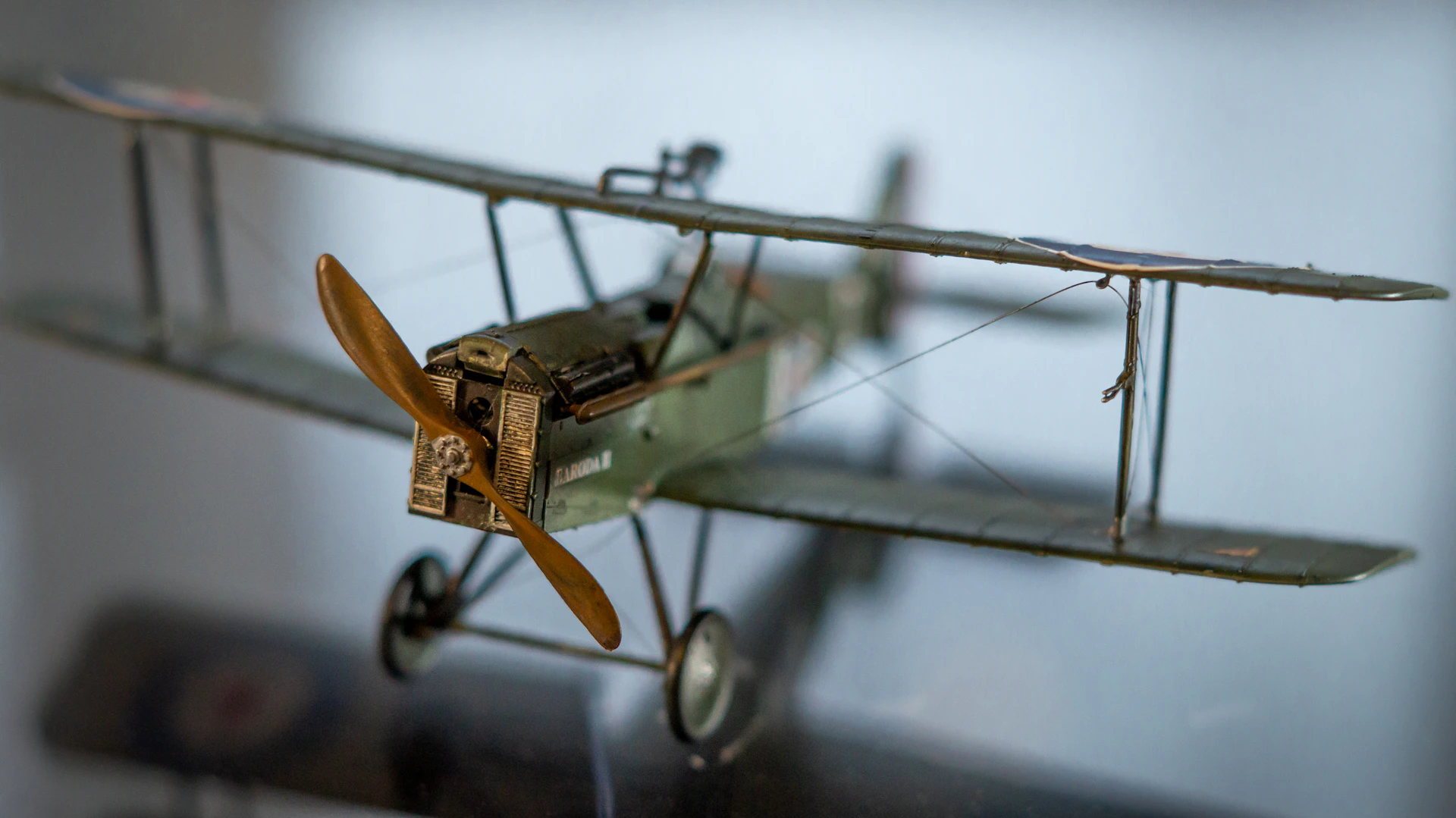 a model of a single engine plane on a table