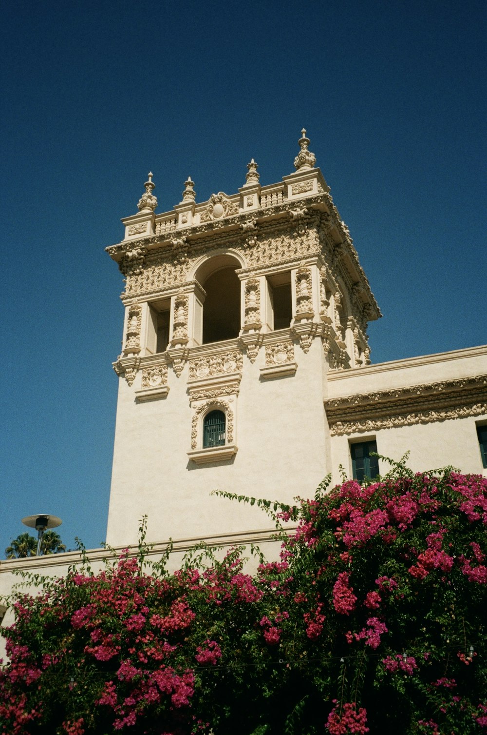 a tall building with a clock on the top of it