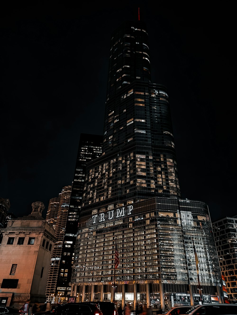 a very tall building lit up at night