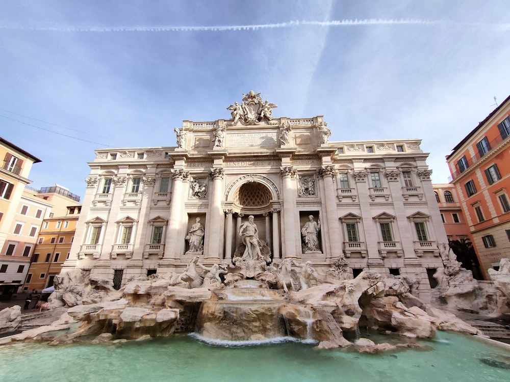 a building with a fountain in front of it