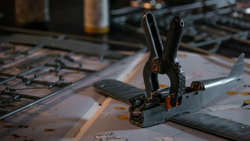 a pair of scissors sitting on top of a piece of paper