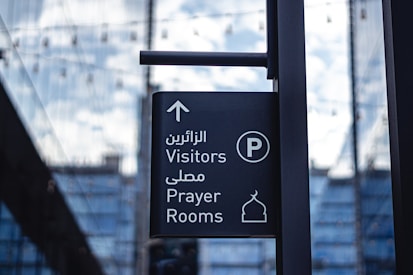 a black and white sign that is on a pole