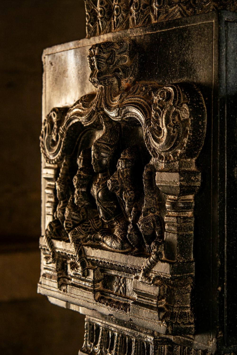a close up of an ornately carved piece of wood