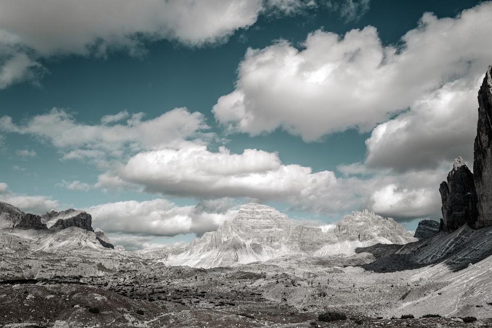 a black and white photo of a mountain range