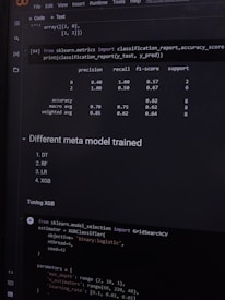 A computer screen displaying a coding interface with Python code related to machine learning. The code imports libraries like sklearn and deals with model metrics such as precision and recall. A classification report is shown along with a section titled 'Different meta model trained' listing various models like DT, RF, LR, and XGB. Below, there is code for tuning an XGB model using GridSearchCV.