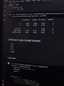 A computer screen displaying a coding interface with Python code related to machine learning. The code imports libraries like sklearn and deals with model metrics such as precision and recall. A classification report is shown along with a section titled 'Different meta model trained' listing various models like DT, RF, LR, and XGB. Below, there is code for tuning an XGB model using GridSearchCV.
