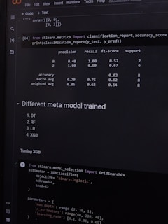 A computer screen displaying a coding interface with Python code related to machine learning. The code imports libraries like sklearn and deals with model metrics such as precision and recall. A classification report is shown along with a section titled 'Different meta model trained' listing various models like DT, RF, LR, and XGB. Below, there is code for tuning an XGB model using GridSearchCV.