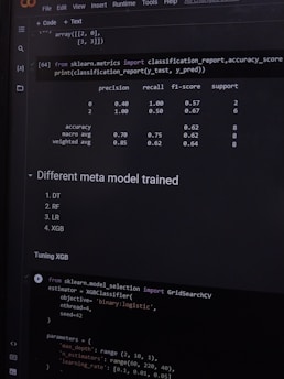 A computer screen displaying a coding interface with Python code related to machine learning. The code imports libraries like sklearn and deals with model metrics such as precision and recall. A classification report is shown along with a section titled 'Different meta model trained' listing various models like DT, RF, LR, and XGB. Below, there is code for tuning an XGB model using GridSearchCV.