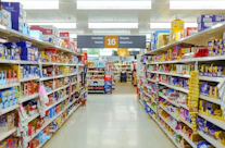 a grocery store aisle filled with lots of food