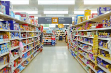 a grocery store aisle filled with lots of food