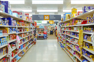 a grocery store aisle filled with lots of food