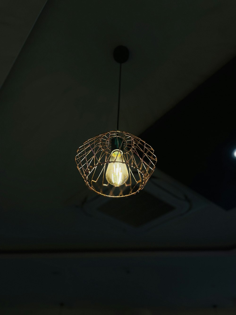 a light that is hanging from a ceiling