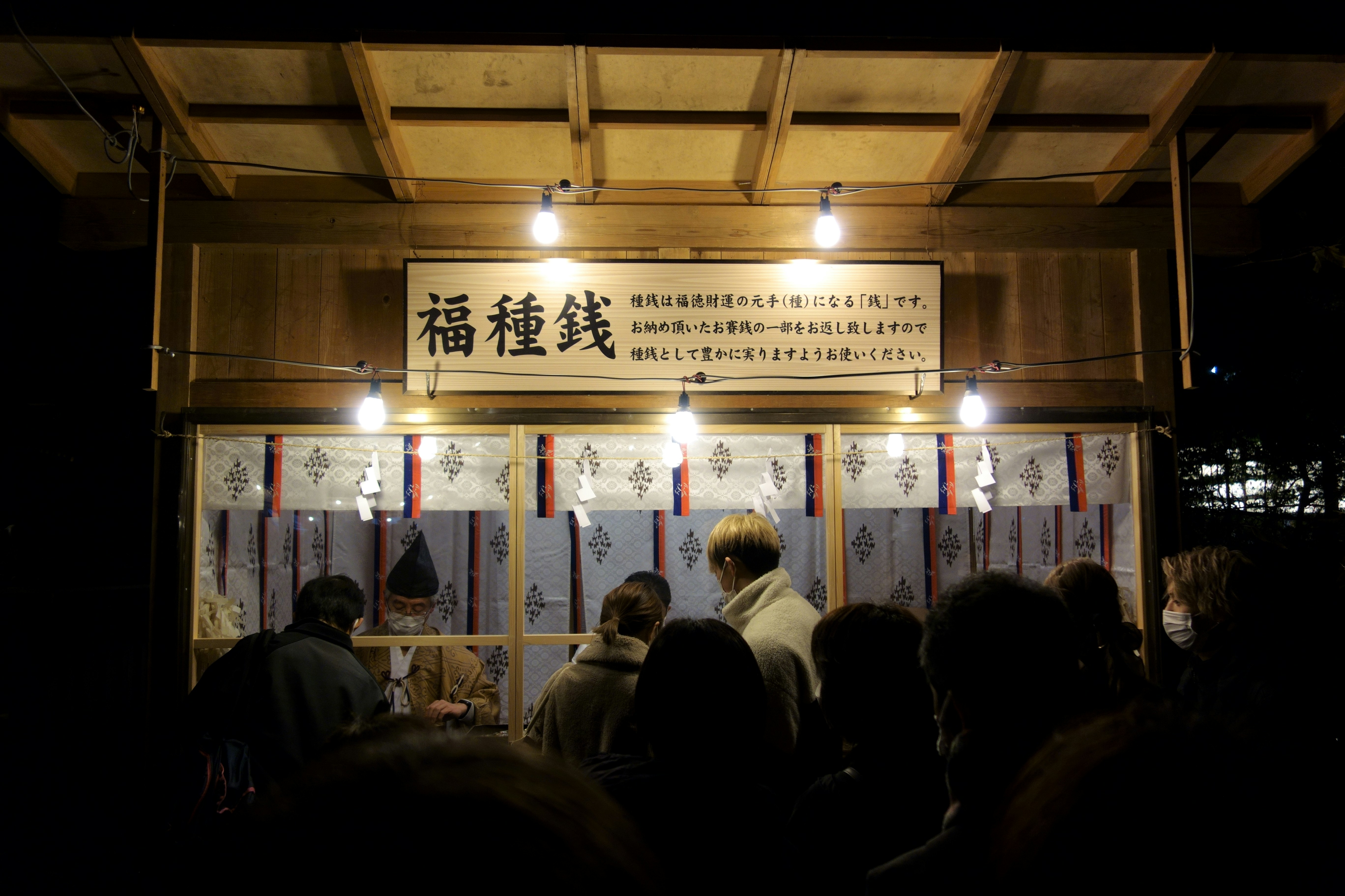 a group of people standing in front of a building