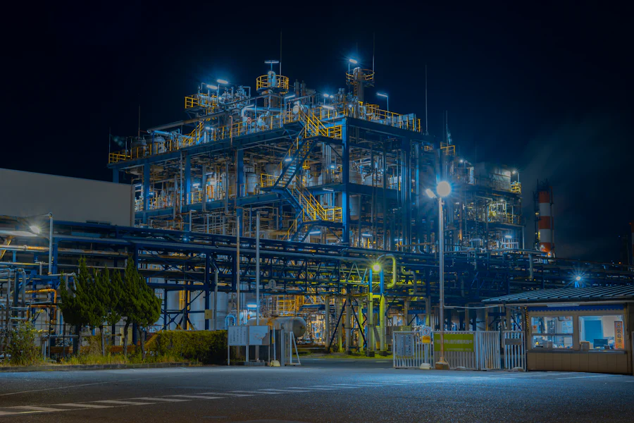 Large industrial processing plant lit at night in Egypt