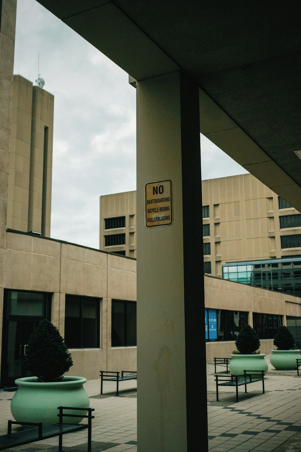 a no parking sign on the side of a building