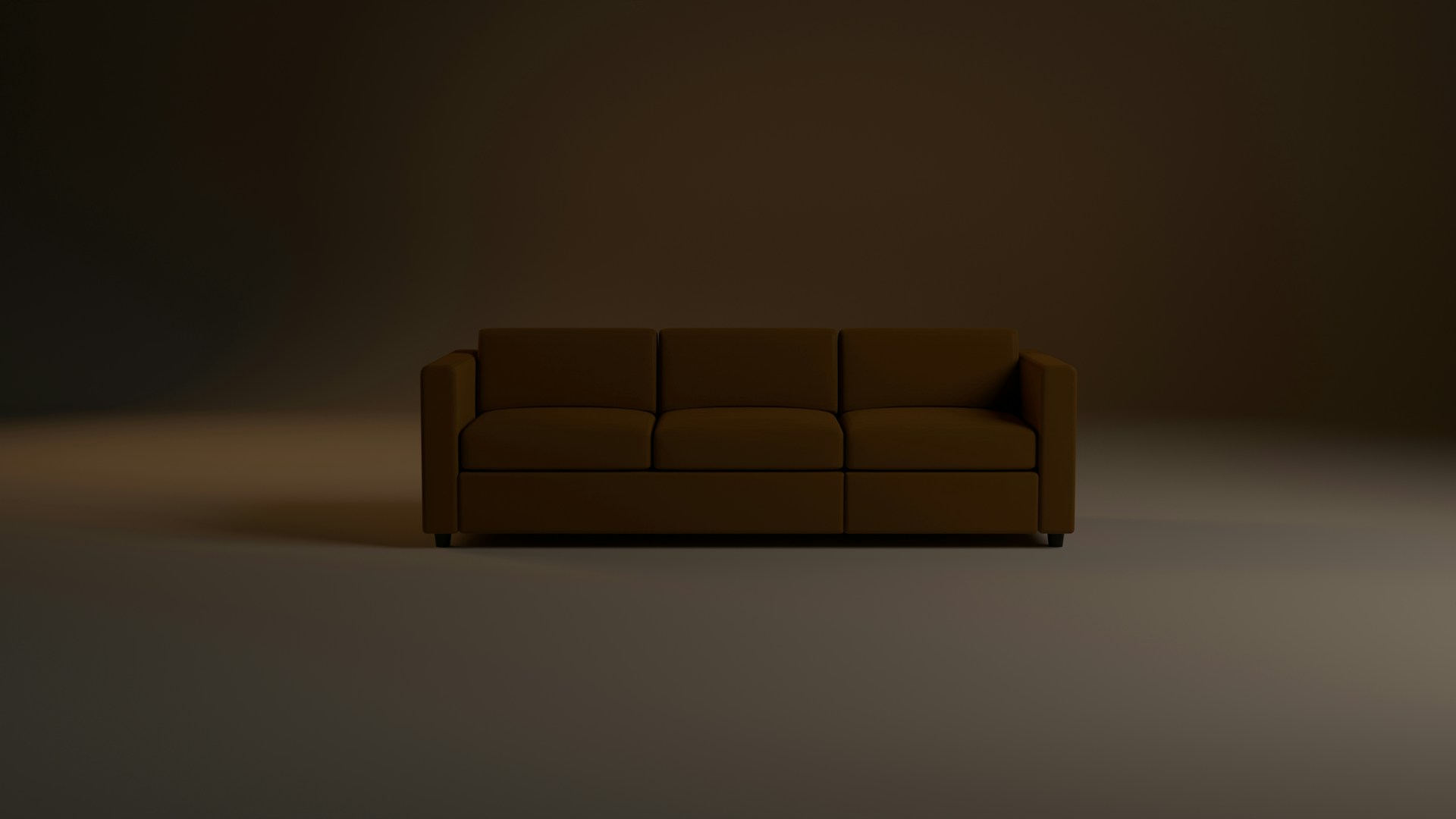a brown couch sitting in the middle of a room