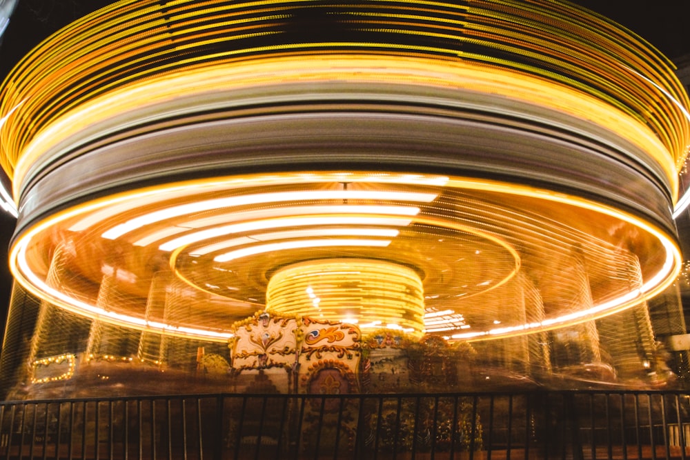a carousel ride at night with a lot of lights