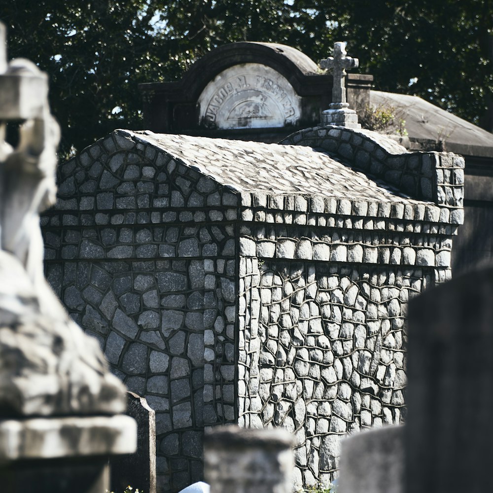 a stone structure with a clock on top of it