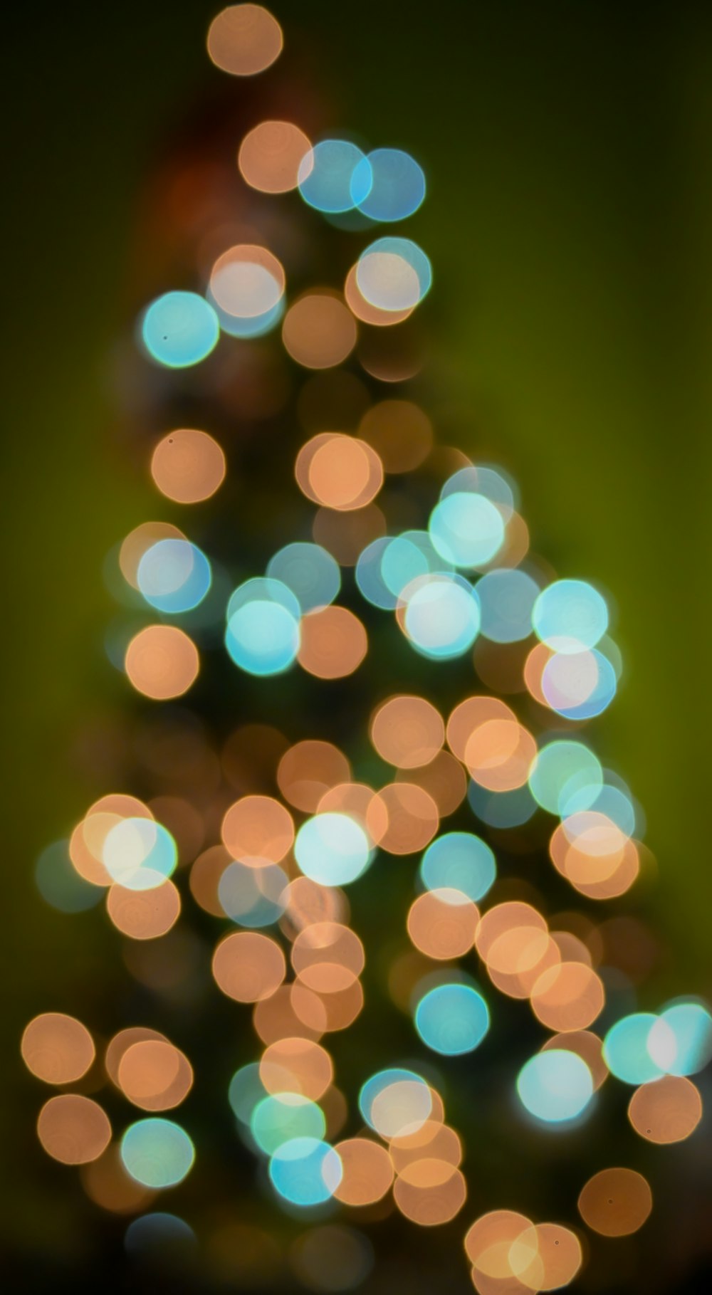 a blurry photo of a lit christmas tree
