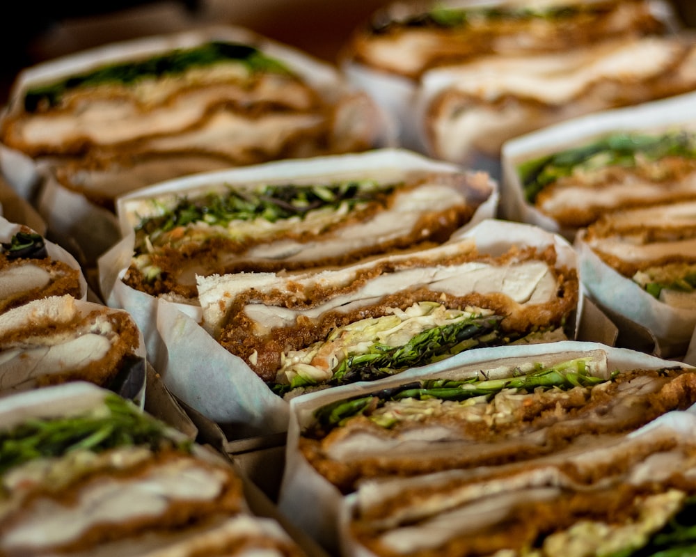 a close up of a tray of sandwiches