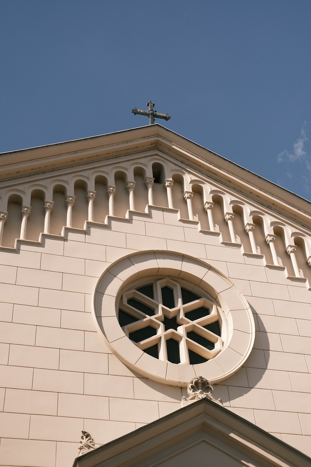 a church steeple with a cross on top of it