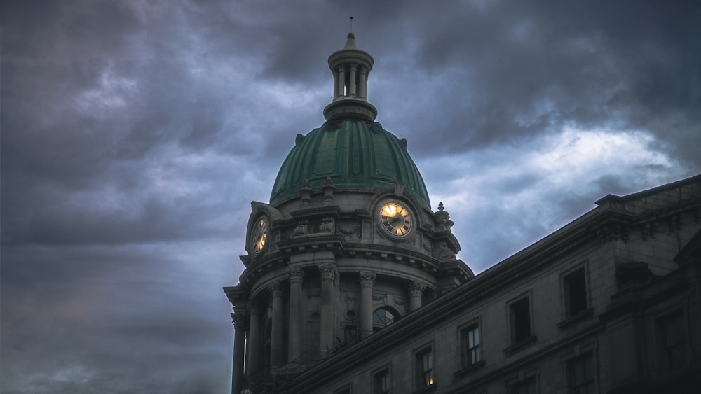 a large building with a clock on the top of it