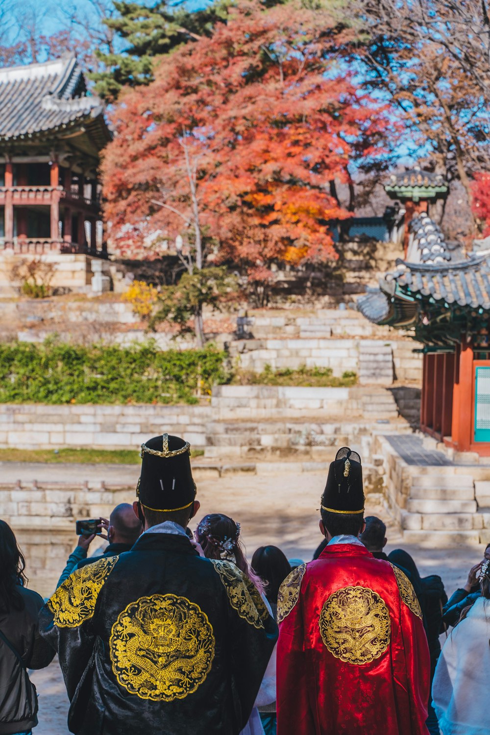 a group of people standing in front of a building