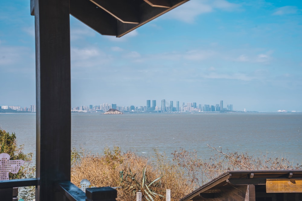 a view of a large body of water with a city in the background