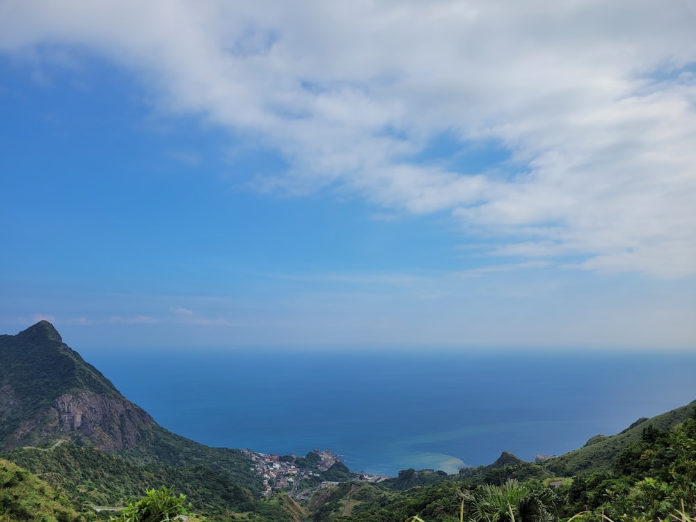 a view of the ocean from the top of a mountain