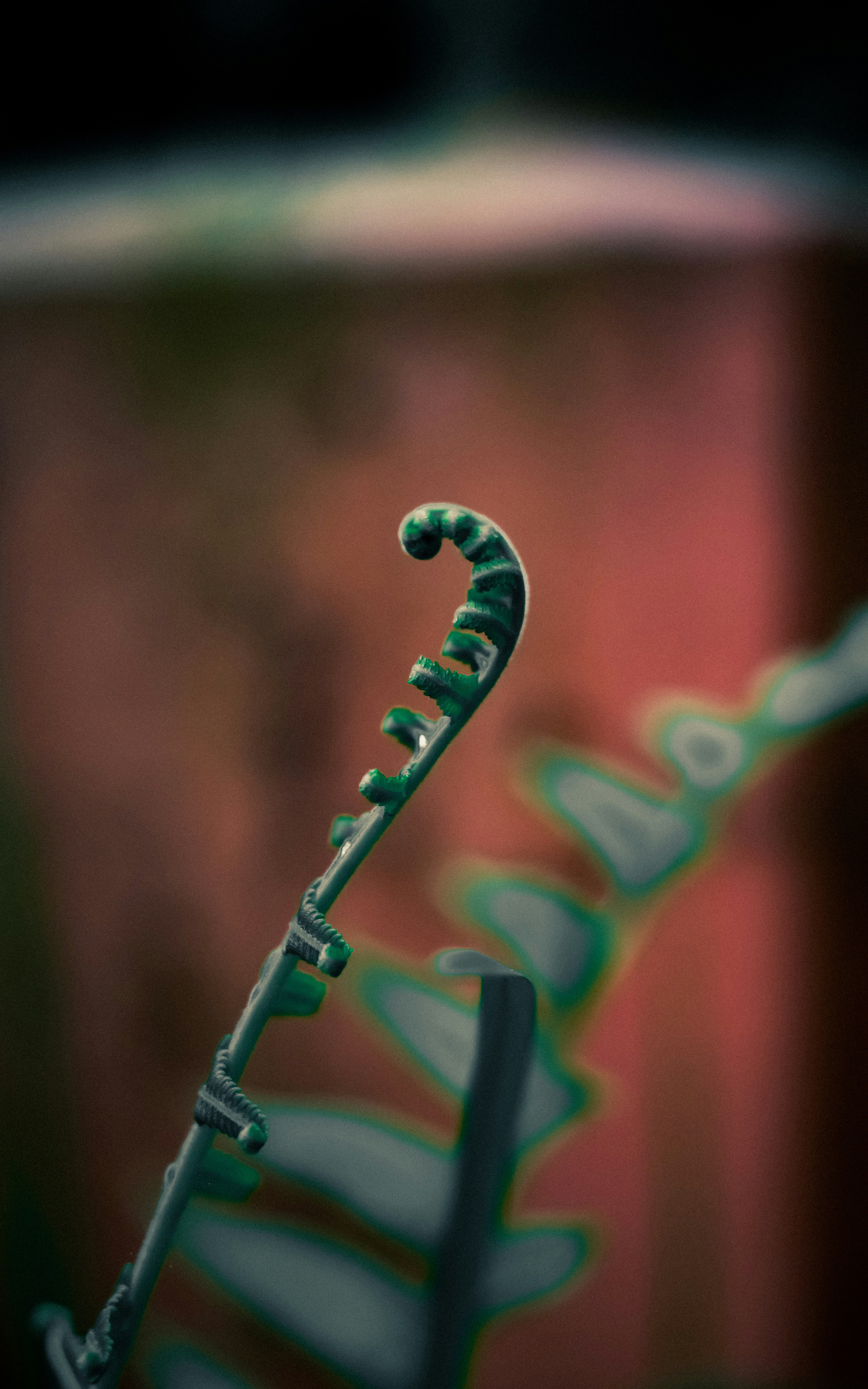 a close up of a metal object with a blurry background