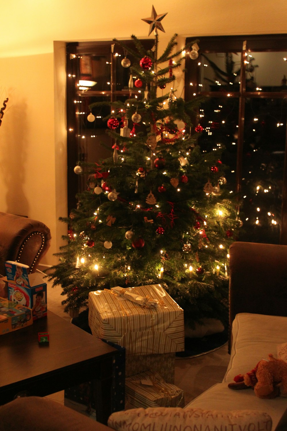 a decorated christmas tree in a living room