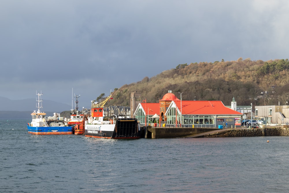 a group of boats that are sitting in the water