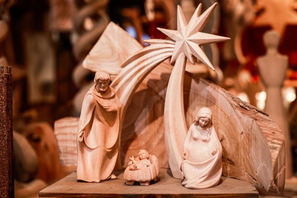 a nativity scene of a manger scene with a star