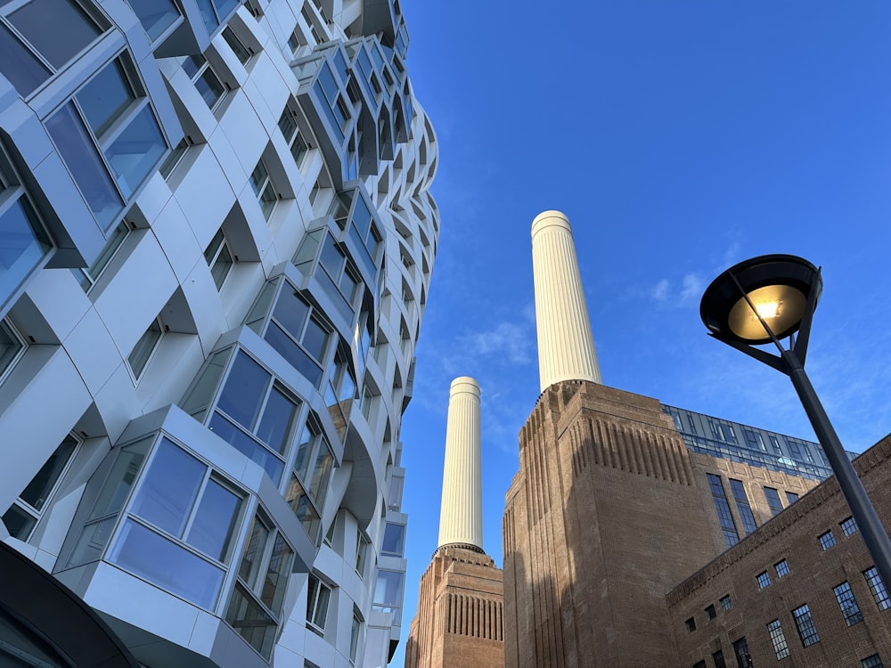 a tall building next to a very tall building