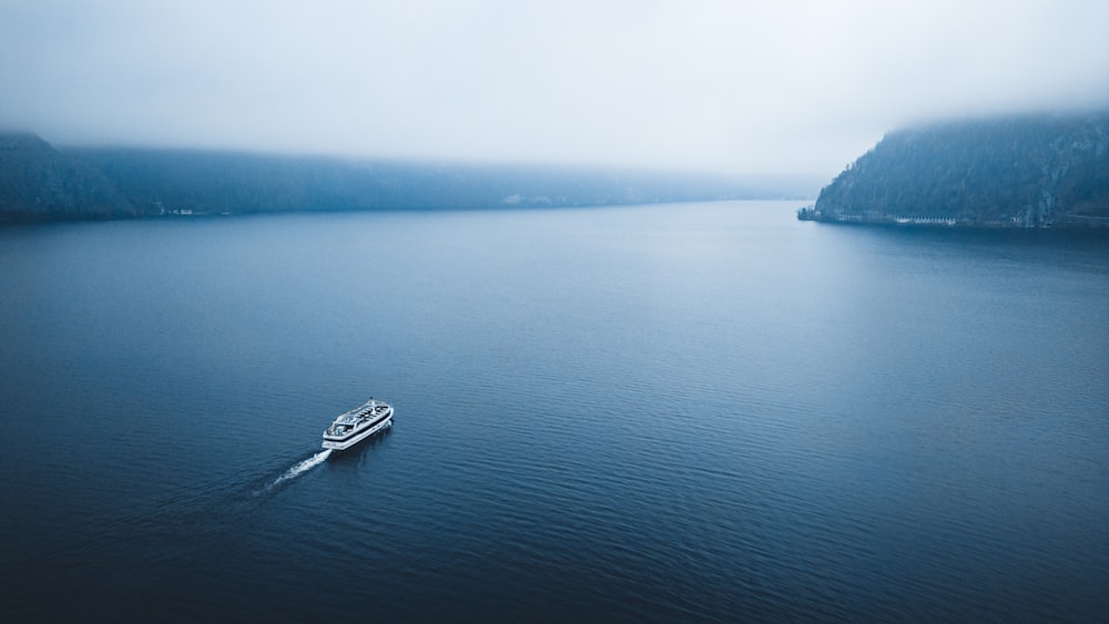 a boat in the middle of a large body of water