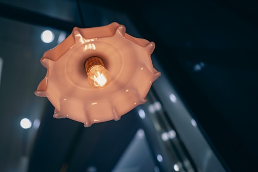 Close-up of unique decorative lighting casting warm glows in a cozy room.